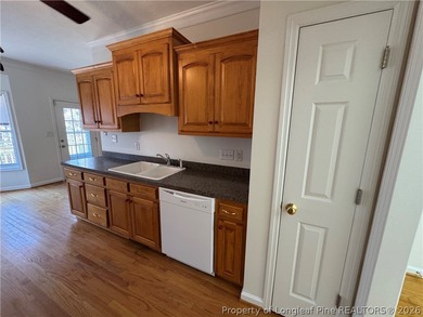 Welcome home to this charming 3 bedroom 2 bath ranch with a on Carolina Lakes Country Club in North Carolina - for sale on GolfHomes.com, golf home, golf lot