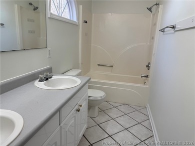 Welcome home to this charming 3 bedroom 2 bath ranch with a on Carolina Lakes Country Club in North Carolina - for sale on GolfHomes.com, golf home, golf lot