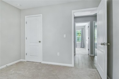 WELCOME TO THIS NEARLY NEW FOUR-BEDROOM, THREE-CAR GARAGE HOME on The Club At Osprey Cove in Georgia - for sale on GolfHomes.com, golf home, golf lot