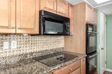 Beautifully maintained single-story home at the head of Sun City on Union Hills Country Club in Arizona - for sale on GolfHomes.com, golf home, golf lot