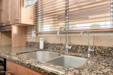 Beautifully maintained single-story home at the head of Sun City on Union Hills Country Club in Arizona - for sale on GolfHomes.com, golf home, golf lot