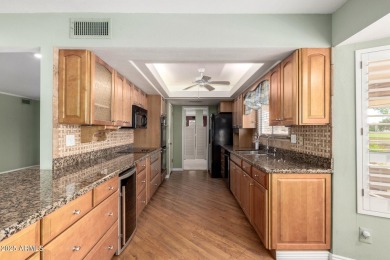 Beautifully maintained single-story home at the head of Sun City on Union Hills Country Club in Arizona - for sale on GolfHomes.com, golf home, golf lot