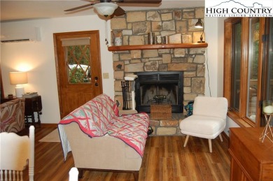 Escape to your own peaceful retreat with 2 bed / 3 bath on Land Harbor Golf Course in North Carolina - for sale on GolfHomes.com, golf home, golf lot