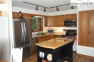 Escape to your own peaceful retreat with 2 bed / 3 bath on Land Harbor Golf Course in North Carolina - for sale on GolfHomes.com, golf home, golf lot