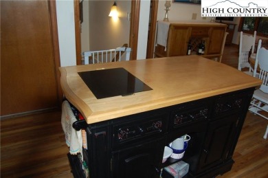 Escape to your own peaceful retreat with 2 bed / 3 bath on Land Harbor Golf Course in North Carolina - for sale on GolfHomes.com, golf home, golf lot
