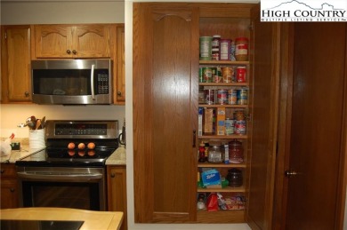 Escape to your own peaceful retreat with 2 bed / 3 bath on Land Harbor Golf Course in North Carolina - for sale on GolfHomes.com, golf home, golf lot