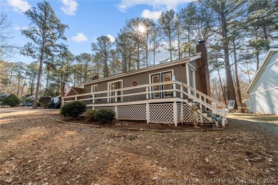 Enjoy resort-style living in this charming 2 bedroom, 2 bath on Carolina Trace Country Club in North Carolina - for sale on GolfHomes.com, golf home, golf lot