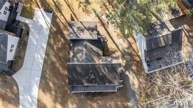 Enjoy resort-style living in this charming 2 bedroom, 2 bath on Carolina Trace Country Club in North Carolina - for sale on GolfHomes.com, golf home, golf lot