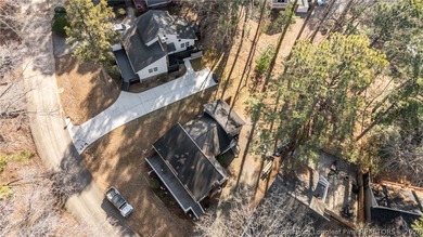 Enjoy resort-style living in this charming 2 bedroom, 2 bath on Carolina Trace Country Club in North Carolina - for sale on GolfHomes.com, golf home, golf lot