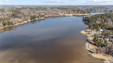 Enjoy resort-style living in this charming 2 bedroom, 2 bath on Carolina Trace Country Club in North Carolina - for sale on GolfHomes.com, golf home, golf lot