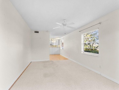 Welcome to this charming 2-bedroom, 2-bath first-floor corner on The American Golf Club in Florida - for sale on GolfHomes.com, golf home, golf lot