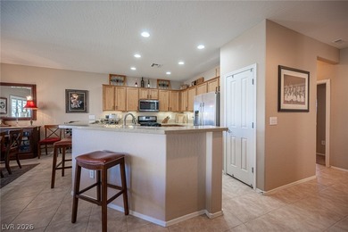 Stunning single-story home in Sun City Aliante! Beautifully on Aliante Golf Club in Nevada - for sale on GolfHomes.com, golf home, golf lot