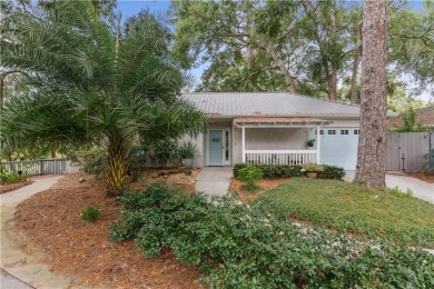 This charming and comfortable bungalow offers beautiful views of on Sea Island Golf Club in Georgia - for sale on GolfHomes.com, golf home, golf lot