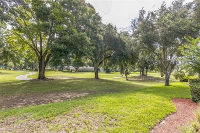 This St. James floor plan backing on the 10th tee of the Kings on Kings Ridge Golf Club in Florida - for sale on GolfHomes.com, golf home, golf lot