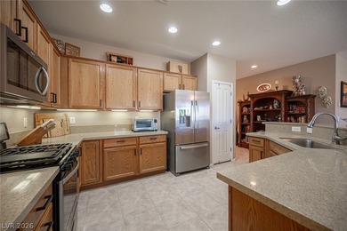 Stunning single-story home in Sun City Aliante! Beautifully on Aliante Golf Club in Nevada - for sale on GolfHomes.com, golf home, golf lot