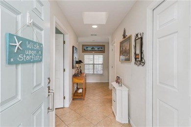 This charming and comfortable bungalow offers beautiful views of on Sea Island Golf Club in Georgia - for sale on GolfHomes.com, golf home, golf lot