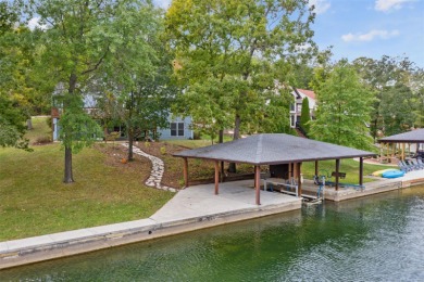 Beautiful WATERFRONT home situated on a 127+ acre lake with on Raintree Country Club in Missouri - for sale on GolfHomes.com, golf home, golf lot