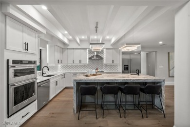 Refined luxury awaits at this fully remodeled estate in the on Fiddlesticks Country Club in Florida - for sale on GolfHomes.com, golf home, golf lot