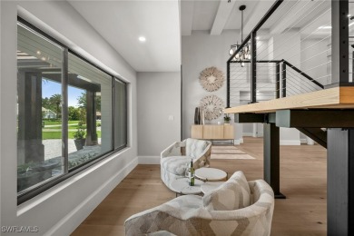 Refined luxury awaits at this fully remodeled estate in the on Fiddlesticks Country Club in Florida - for sale on GolfHomes.com, golf home, golf lot