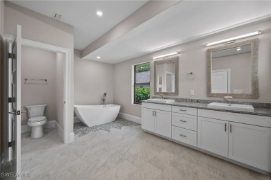 Refined luxury awaits at this fully remodeled estate in the on Fiddlesticks Country Club in Florida - for sale on GolfHomes.com, golf home, golf lot