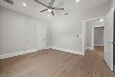 Refined luxury awaits at this fully remodeled estate in the on Fiddlesticks Country Club in Florida - for sale on GolfHomes.com, golf home, golf lot
