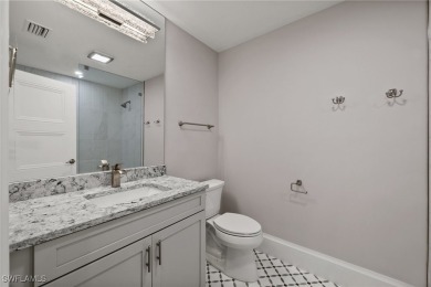 Refined luxury awaits at this fully remodeled estate in the on Fiddlesticks Country Club in Florida - for sale on GolfHomes.com, golf home, golf lot