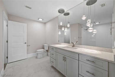 Refined luxury awaits at this fully remodeled estate in the on Fiddlesticks Country Club in Florida - for sale on GolfHomes.com, golf home, golf lot