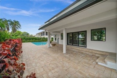Refined luxury awaits at this fully remodeled estate in the on Fiddlesticks Country Club in Florida - for sale on GolfHomes.com, golf home, golf lot