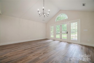 Live the Lake Wylie lifestyle in this beautifully updated 3BR/2 on Tega Cay Golf Club in South Carolina - for sale on GolfHomes.com, golf home, golf lot