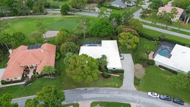 Country Club Estates!  Enjoy Florida living in this 5/3.5/3 with on St. Lucie Trail Golf Club in Florida - for sale on GolfHomes.com, golf home, golf lot