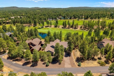 Overlooking the lush fairways and a tranquil water feature of on Torreon Golf Club in Arizona - for sale on GolfHomes.com, golf home, golf lot