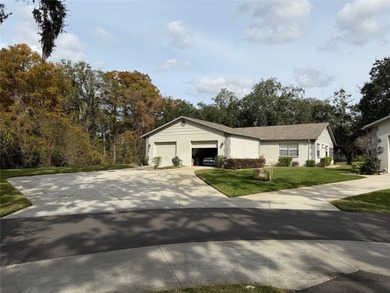 Welcome to this beautifully updated 2-bedroom, 2-bath condo on Seven Springs Golf and Country Club in Florida - for sale on GolfHomes.com, golf home, golf lot