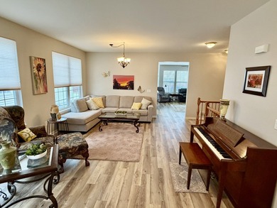 Delightful, sun-filled ranch with a finished basement nestled in on Carillon Lakes 3 Hole Course in Illinois - for sale on GolfHomes.com, golf home, golf lot