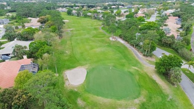 Country Club Estates!  Enjoy Florida living in this 5/3.5/3 with on St. Lucie Trail Golf Club in Florida - for sale on GolfHomes.com, golf home, golf lot