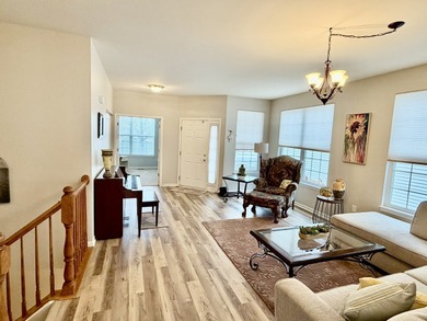 Delightful, sun-filled ranch with a finished basement nestled in on Carillon Lakes 3 Hole Course in Illinois - for sale on GolfHomes.com, golf home, golf lot