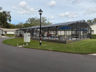 Welcome to this beautifully updated 2-bedroom, 2-bath condo on Seven Springs Golf and Country Club in Florida - for sale on GolfHomes.com, golf home, golf lot