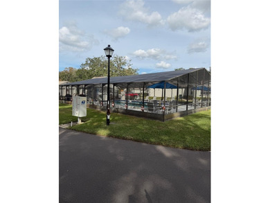 Welcome to this beautifully updated 2-bedroom, 2-bath condo on Seven Springs Golf and Country Club in Florida - for sale on GolfHomes.com, golf home, golf lot