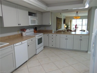 Best buy in Imperial Golf Estates.  Spacious light & bright 2nd on Colliers Reserve Country Club in Florida - for sale on GolfHomes.com, golf home, golf lot