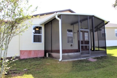 Charming 3-Bed, 3-Bath Home in Lady Lake Orange Blossom Gardens on Orange Blossom Hills Golf and Country Club in Florida - for sale on GolfHomes.com, golf home, golf lot