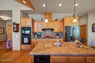 Overlooking the lush fairways and a tranquil water feature of on Torreon Golf Club in Arizona - for sale on GolfHomes.com, golf home, golf lot