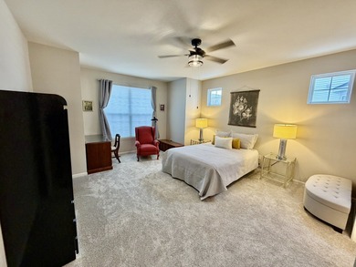 Delightful, sun-filled ranch with a finished basement nestled in on Carillon Lakes 3 Hole Course in Illinois - for sale on GolfHomes.com, golf home, golf lot