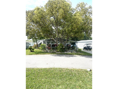Your Private Oasis Awaits: Stunning Corner Lot 2-Bedroom on Schalamar Creek Golf and Country Club in Florida - for sale on GolfHomes.com, golf home, golf lot