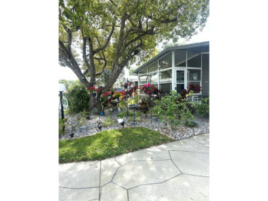 Your Private Oasis Awaits: Stunning Corner Lot 2-Bedroom on Schalamar Creek Golf and Country Club in Florida - for sale on GolfHomes.com, golf home, golf lot
