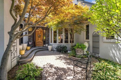 A beautiful French Normandy style former Parade Home that backs on BanBury Golf Club in Idaho - for sale on GolfHomes.com, golf home, golf lot