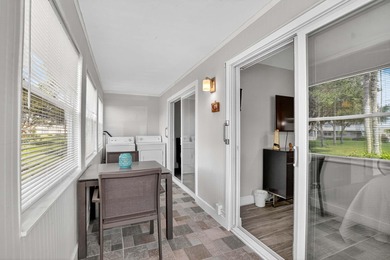 Well-planned, thoughtful renovations have created an open on Kings Point Golf -Flanders Way in Florida - for sale on GolfHomes.com, golf home, golf lot