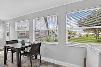 Well-planned, thoughtful renovations have created an open on Kings Point Golf -Flanders Way in Florida - for sale on GolfHomes.com, golf home, golf lot