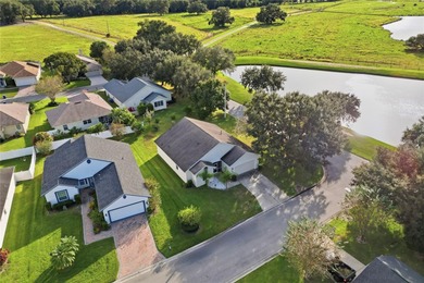 Welcome home to this beautiful three bedroom, two bathroom on Cypresswood Golf and Country Club in Florida - for sale on GolfHomes.com, golf home, golf lot