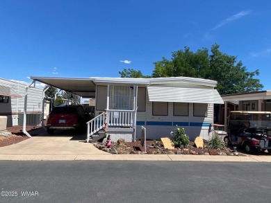 This cozy park model features 2 full bathrooms, a 40 gal hot on Juniper Ridge R.V. Golf Resort in Arizona - for sale on GolfHomes.com, golf home, golf lot