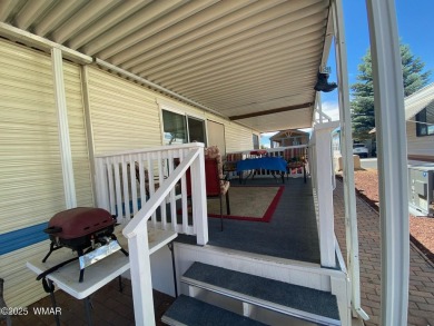 This cozy park model features 2 full bathrooms, a 40 gal hot on Juniper Ridge R.V. Golf Resort in Arizona - for sale on GolfHomes.com, golf home, golf lot