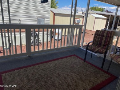 This cozy park model features 2 full bathrooms, a 40 gal hot on Juniper Ridge R.V. Golf Resort in Arizona - for sale on GolfHomes.com, golf home, golf lot